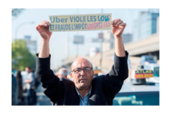 Some Quebec taxi drivers hold strike to protest government’s deal with Uber